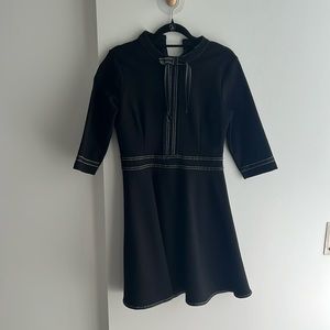 Black elegant dress. It is current too small for me.
